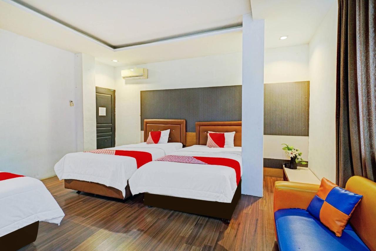 Oyo 90450 Sentra Inn Medan Extérieur photo