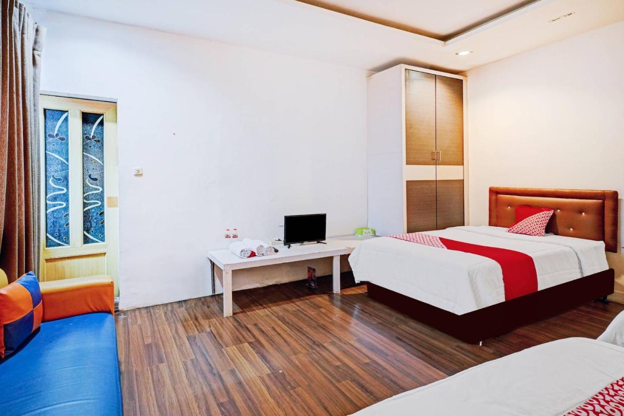 Oyo 90450 Sentra Inn Medan Extérieur photo