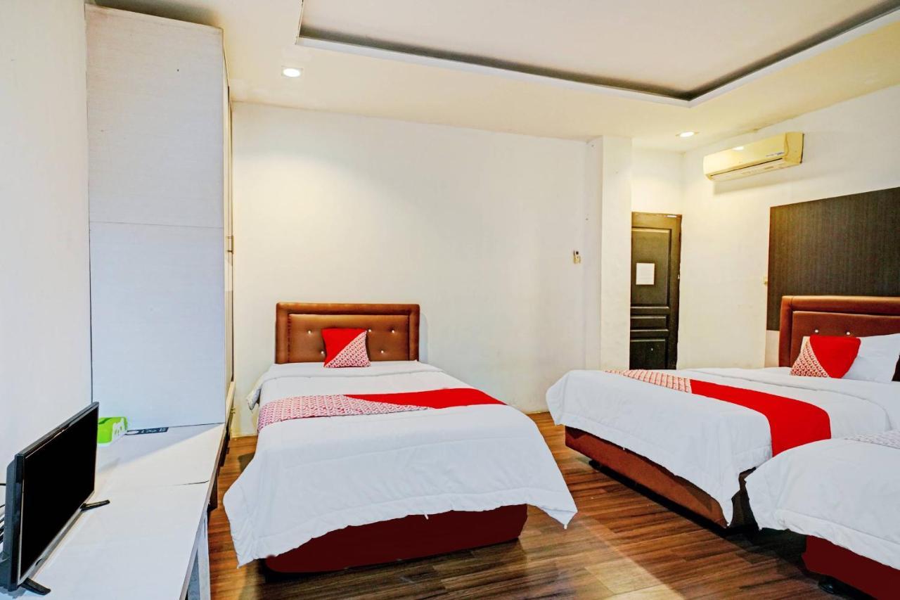Oyo 90450 Sentra Inn Medan Extérieur photo