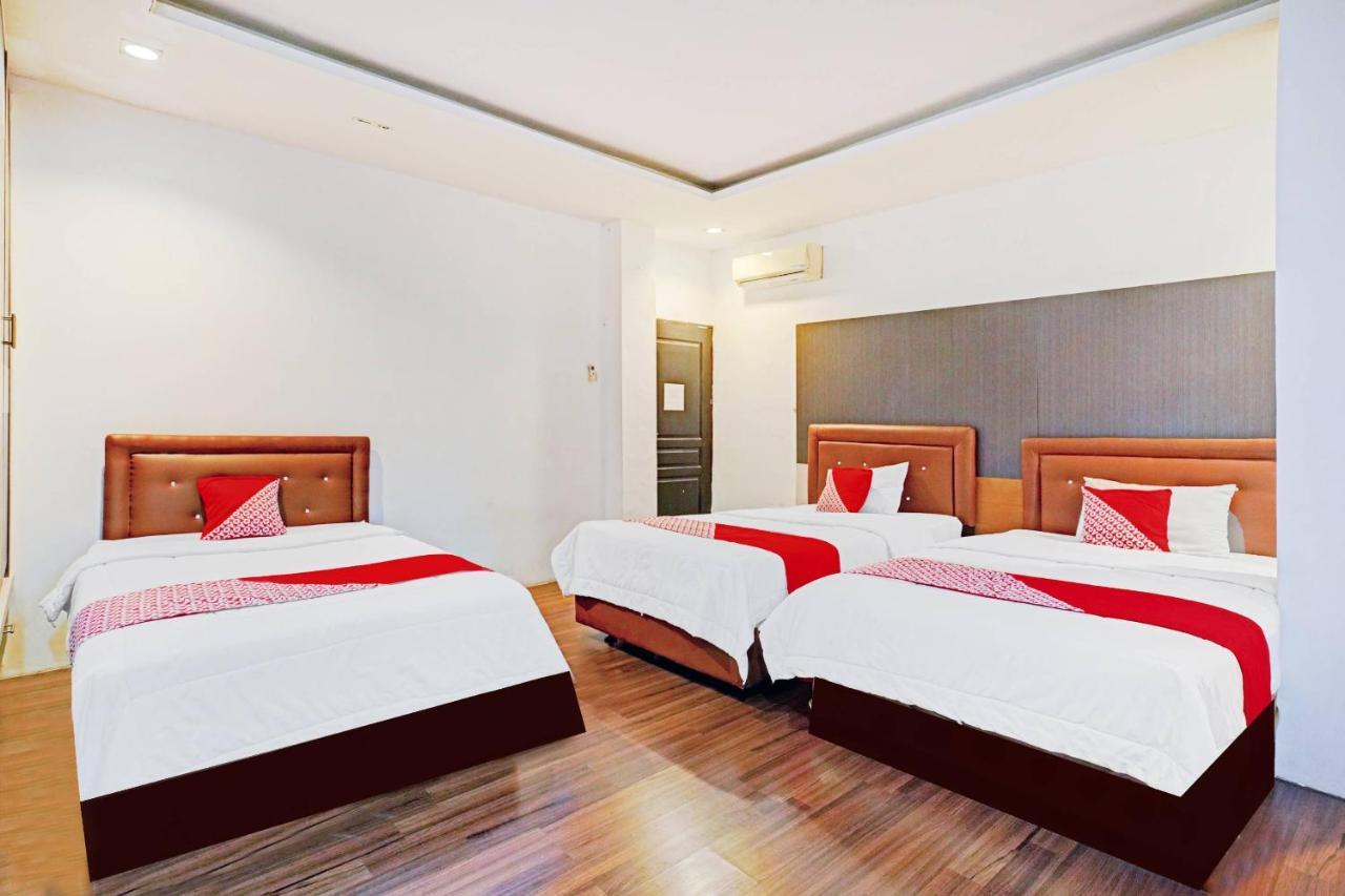 Oyo 90450 Sentra Inn Medan Extérieur photo