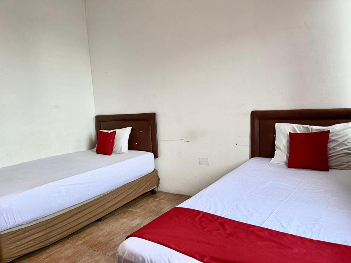 Oyo 90450 Sentra Inn Medan Extérieur photo
