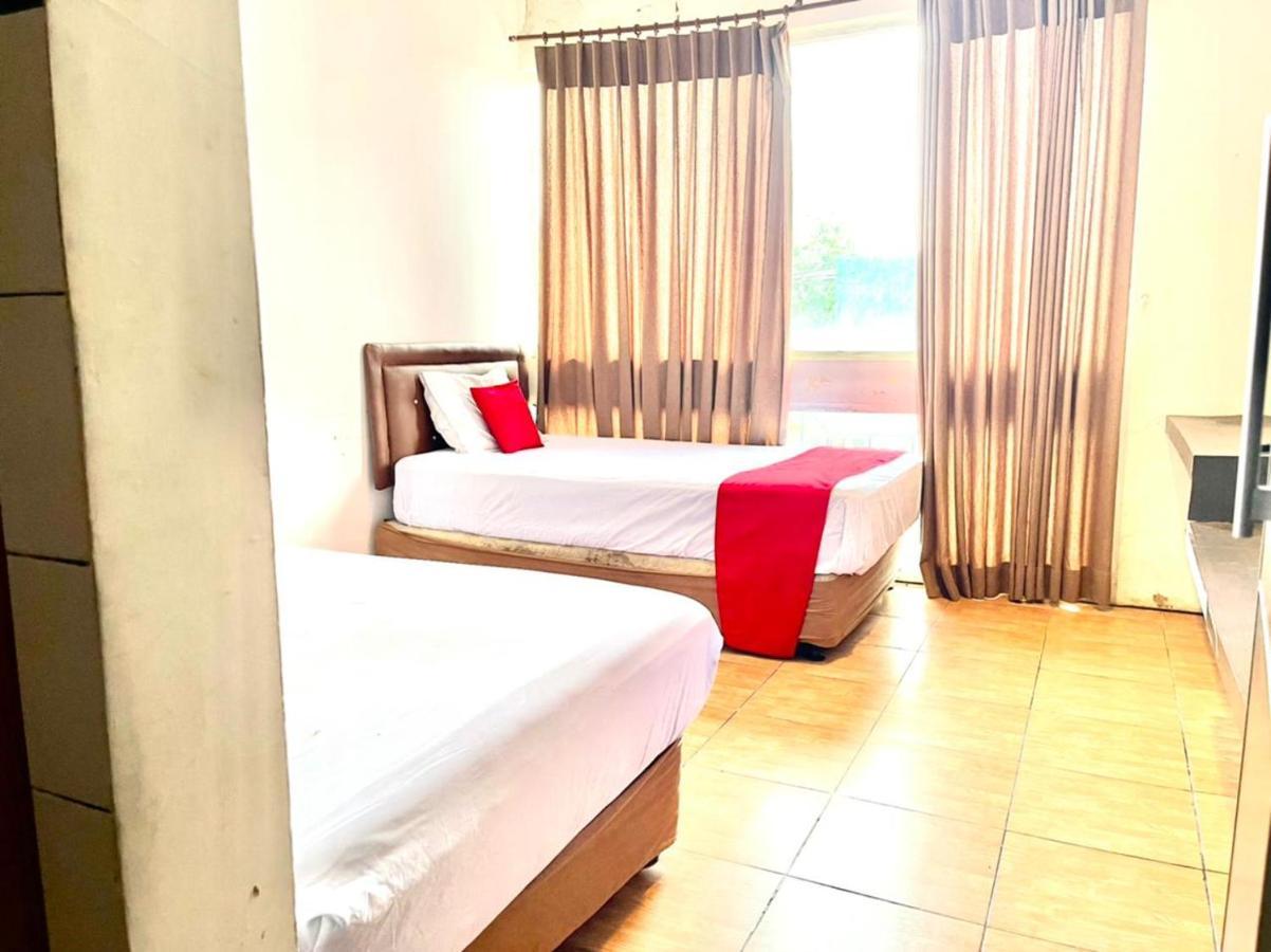 Oyo 90450 Sentra Inn Medan Extérieur photo