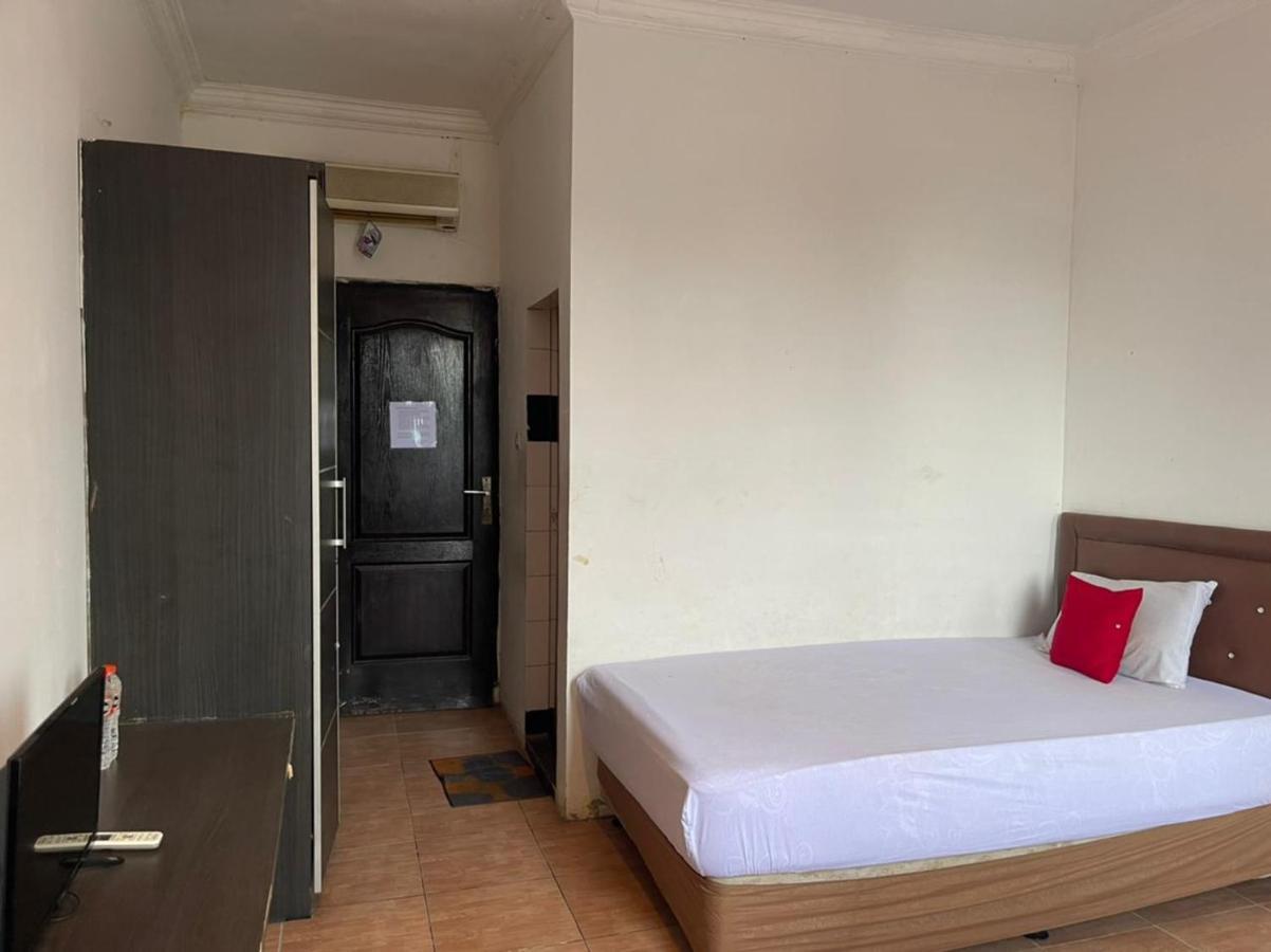 Oyo 90450 Sentra Inn Medan Extérieur photo